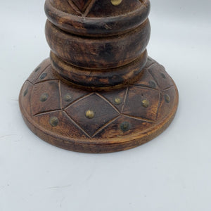 Brown wooden candle stick